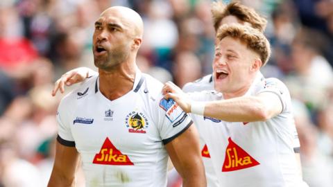 Olly Woodburn celebrates