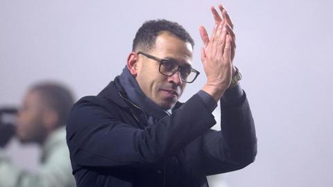 Chelsea manager Liam Rosenior clapping after the win at Charlton