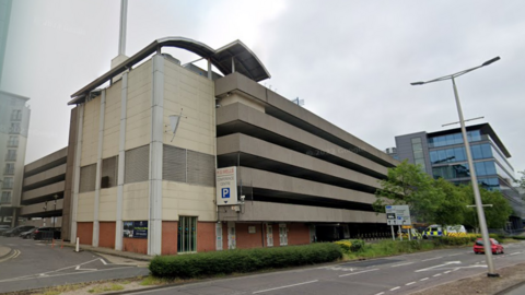 A Google Street image of a six-storey concrete car park.