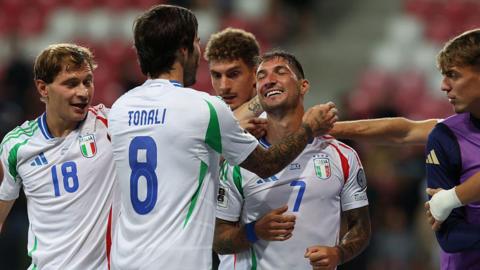 Italy celebrate a goal