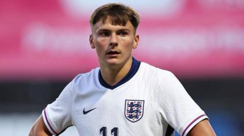 Emre Tezgel in action for England's under-20 side