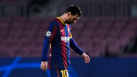 Lionel Messi looks dejected