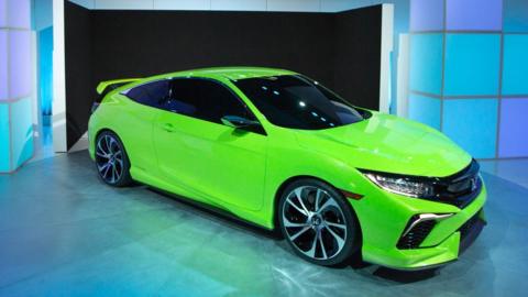 A bright green Honda Civic is unveiled at the New York International Auto Show.