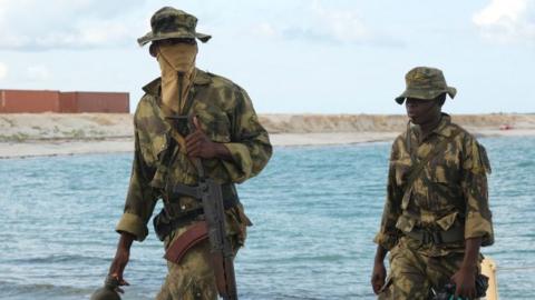 Mozambican marines are seen on the docks of the Total Lng gas plant in Afungi in the Cabo Delgado province, Mozambique, on September 29, 2022.