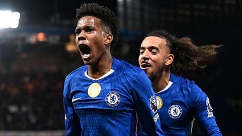 Estevao Willian celebrates after scoring the winner for Chelsea against Liverpool