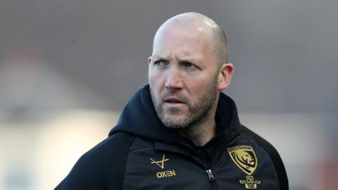 George Skivington on the pitch ahead of Gloucester's game with Leicester