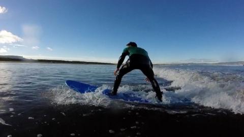 Boy Surfing