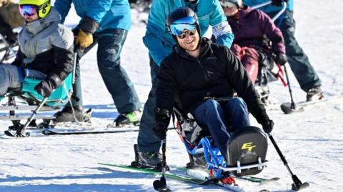 Prince Harry, Duke of Sussex, practices sit-skiing during a visit to the training camp for the Invictus Games Vancouver Whistler 2025, in Whistler, British Columbia, Canada February 14, 2024