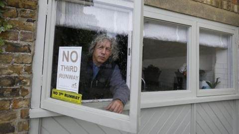 Harmondsworth resident pictured with a 'no third runway' sign