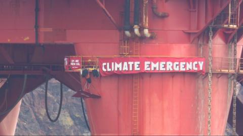 Campaigners' banner on rig