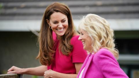 The Duchess of Cambridge smiling with the US First Lady Jill Biden
