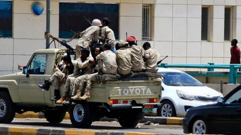 Sudanese security forces on a military vehicle on June 6, 2019 in Khartoum