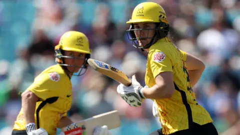 Nat Sciver-Brunt and Beth Mooney running during Trent Rockets' match against MI London