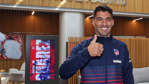Luis Suarez after signing for Atletico Madrid