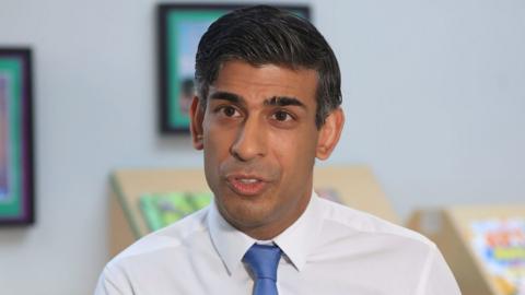 Prime Minister Rishi Sunak speaking to media as he visits Glencraig Integrated Primary School in Holywood, Co Down, during his trip to Northern Ireland following the restoration of the powersharing executive.