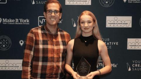 Dr Brendan Paddison and Mariana Kachun pictured at the award ceremony