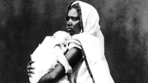 An ayah with a child in India circa 1858