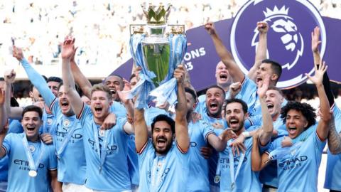 Manchester City lift the 2022-23 Premier League trophy