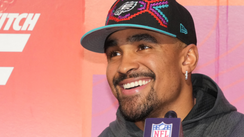 Jalen Hurts speaking at a news conference before Super Bowl 57