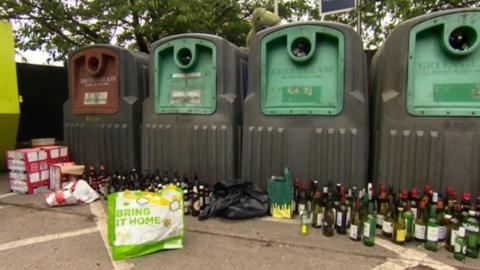 Bottles left outside containers