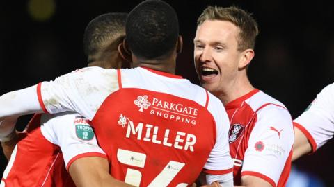 Mickel Miller mobbed after his penalty