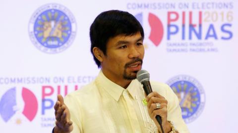 Senator Manny Pacquiao speaks during a news conference after being proclaimed senator on 19 May.