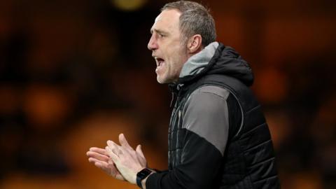 Andy Crosby shouting at players during a Port Vale match