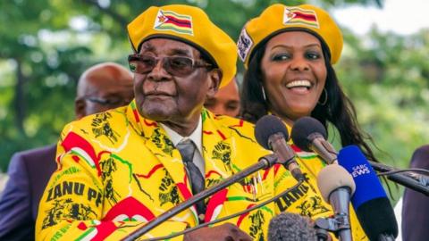 President Robert Mugabe and his wife Grace in matching outfit