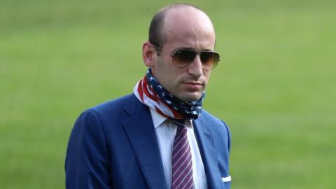 White House Senior Advisor Stephen Miller walks from Marine One to the South Portico of the White House following a day trip to North Carolina, in Washington