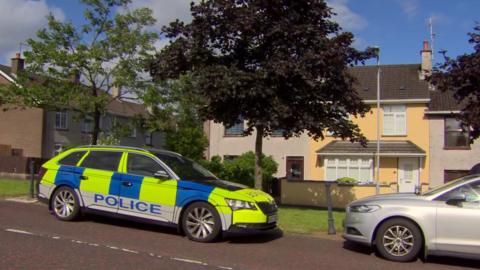 A police car outside the house in Cookstown