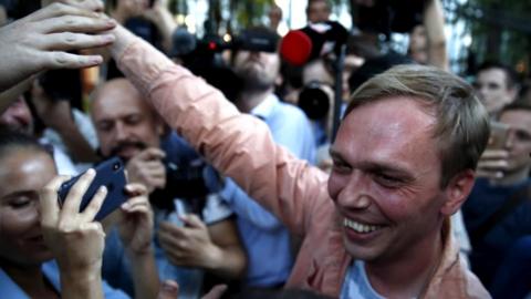 Journalist Ivan Golunov is greeted as he leaves the offices of the Main Investigations Directorate of the Moscow police after being released from custody, 11 June 2019