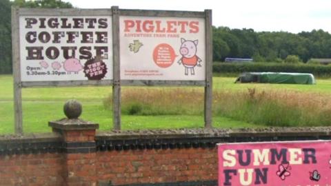 Piglets Adventure Farm sign