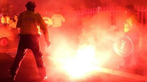 Police officers in disorder outside Villa Park on 30 November 2023