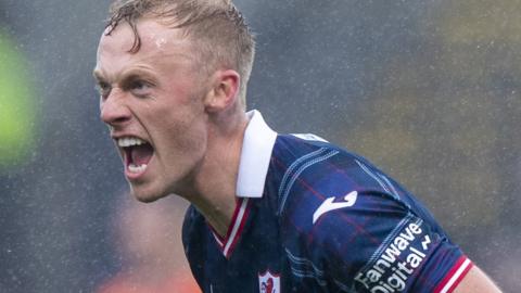 Ross Millen celebrates against Dundee United