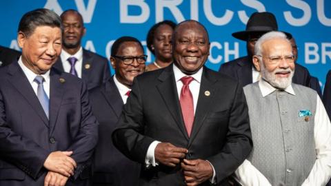 South African President Cyril Ramaphosa with fellow Brics leaders President of China Xi Jinping and Prime Minister of India Narendra Modi pose for a family photo