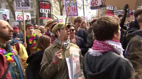Protesters with banners outside Downing Street