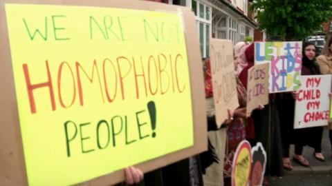 Protesters with signs