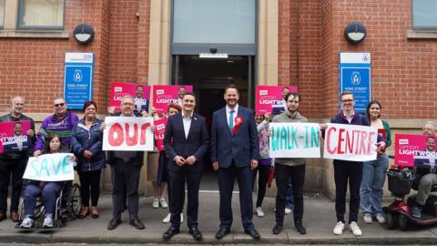 Campaigners outside walk-in centre