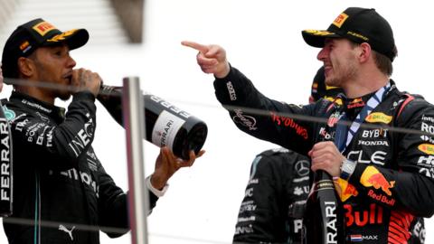 Max Verstappen and Lewis Hamilton celebrate after the Spanish Grand Prix