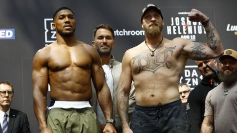 Anthony Joshua faces off with Robert Helenius at the weigh-in