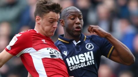 Dael Fry of Middlesbrough is challenged by Benik Afobe of Millwall