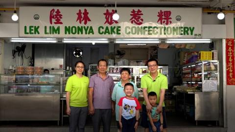 Gavan Sing's family of bakers stand in front of their shop