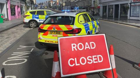 Police at the scene of the incident in Lanark