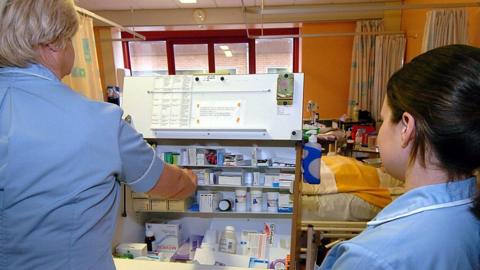 NHS Nurses dispensing drugs in a hospital