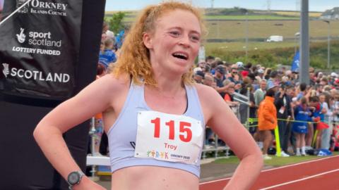 Jess Troy finishes the half marathon