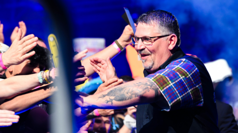 Gary Anderson celebrates at the PDC European Darts Grand Prix in Germany
