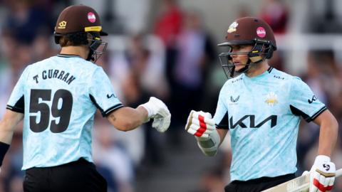 Tom Curran and Sam Curran in action for Surrey