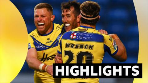 Warrington Wolves' Stefan Ratchford celebrates scoring a try