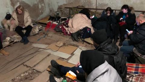 Ukrainian civilians sheltering in basement