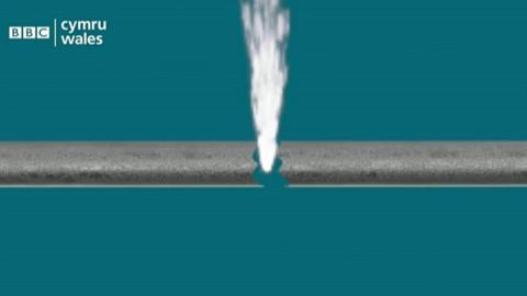 Graphic of burst water pipe